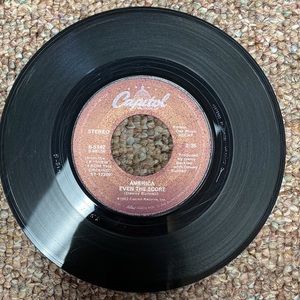 Vtg45 RPM vinyl 1982 Capital records America “Even the Score”&”You can do Magic”